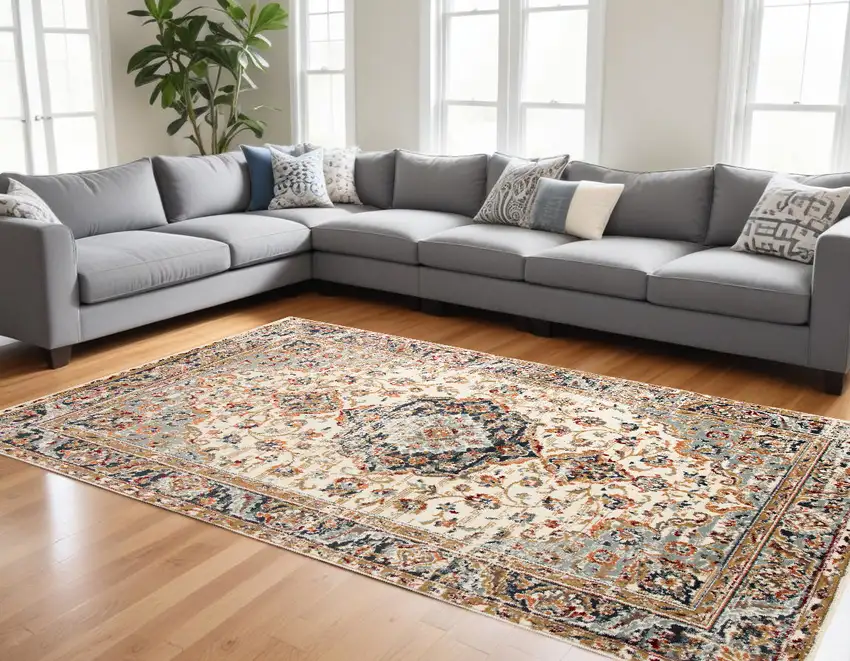 Orange and Ivory Medallion Power Loom Area Rug Photo 1