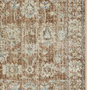 Photo of Orange and Ivory Oriental Power Loom Distressed Runner Rug With Fringe