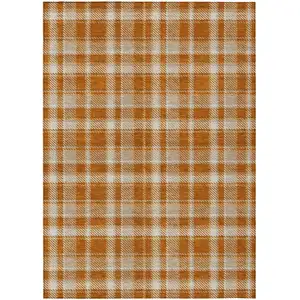 Photo of Orange and Ivory Plaid Washable Non Skid Indoor Outdoor Area Rug