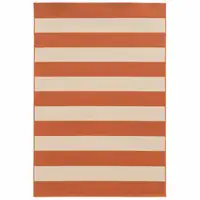 Photo of Orange and Ivory Striped Indoor Outdoor Area Rug