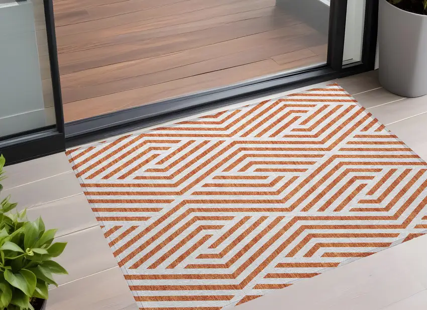 Orange and White Geometric Washable Non Skid Indoor Outdoor Area Rug Photo 1