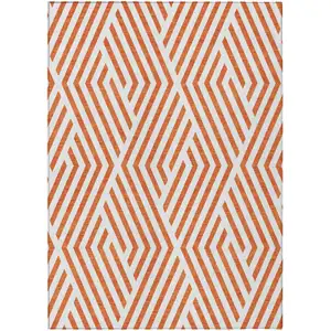 Photo of Orange and White Geometric Washable Non Skid Indoor Outdoor Area Rug