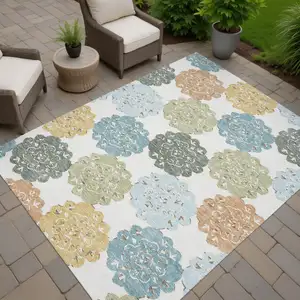 Photo of Pacific Blue Ivory And Copper Quatrefoil Washable Indoor Outdoor Area Rug