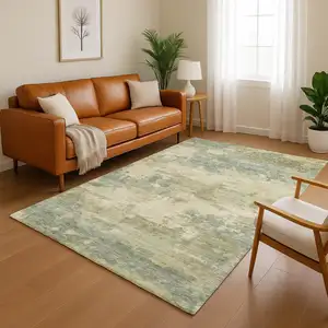 Photo of Pale Aqua And Beige Abstract Washable Area Rug With UV Protection