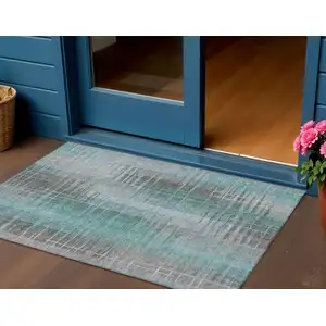 Photo of Pale Aqua And Gray Striped Washable Indoor Outdoor Area Rug