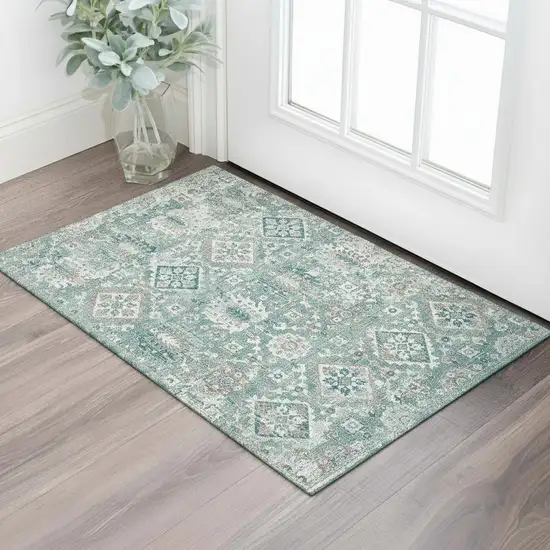 Pale Aqua And Ivory Oriental Washable Area Rug With UV Protection Photo 1