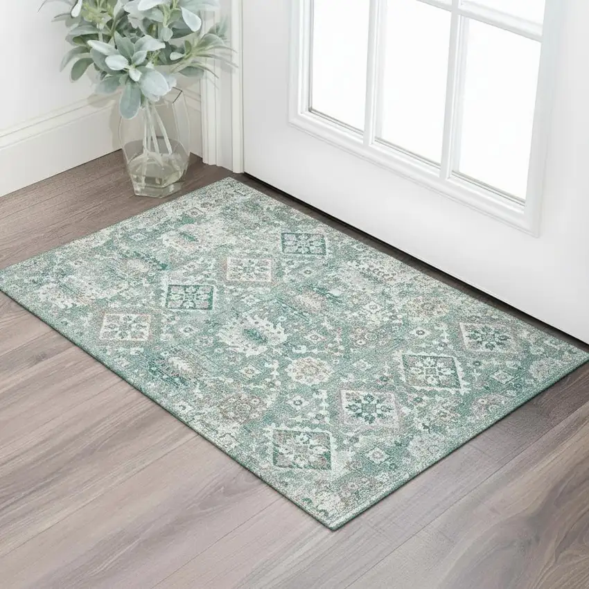 Pale Aqua And Ivory Oriental Washable Area Rug With UV Protection Photo 1