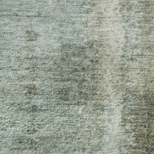 Photo of Pale Aqua Beige And Ivory Abstract Washable Area Rug With UV Protection