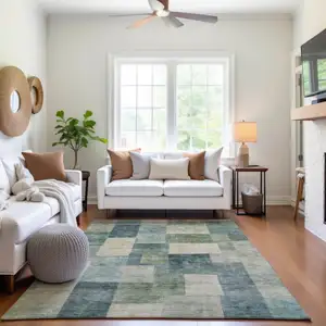 Photo of Pale Aqua Blue And Ivory Geometric Washable Area Rug With UV Protection