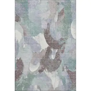 Photo of Pale Aqua Brown And Ivory Abstract Washable Area Rug With UV Protection