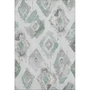 Photo of Pale Aqua Gray And Ivory Abstract Geometric Washable Area Rug With UV Protection