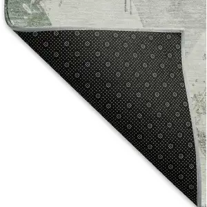 Photo of Pale Aqua Gray And Ivory Abstract Geometric Washable Area Rug With UV Protection