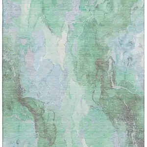 Photo of Pale Aqua Green And Ivory Abstract Washable Area Rug With UV Protection