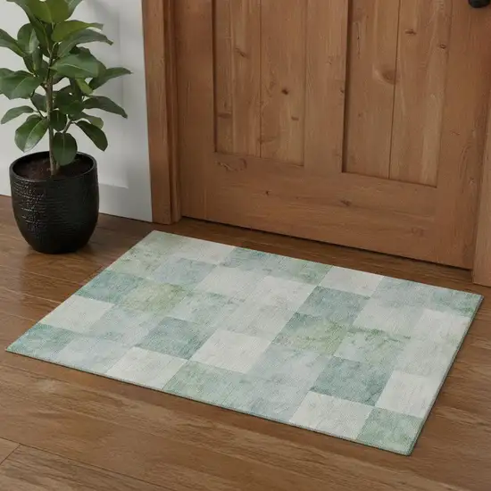 Pale Aqua Mint Green And Ivory Geometric Washable Area Rug With UV Protection Photo 1