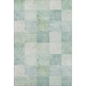 Photo of Pale Aqua Mint Green And Ivory Geometric Washable Area Rug With UV Protection