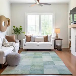 Photo of Pale Aqua Mint Green And Ivory Geometric Washable Area Rug With UV Protection