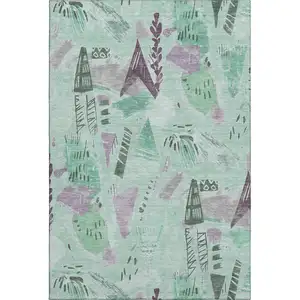 Photo of Pale Aqua Teal And Green Geometric Washable Area Rug With UV Protection
