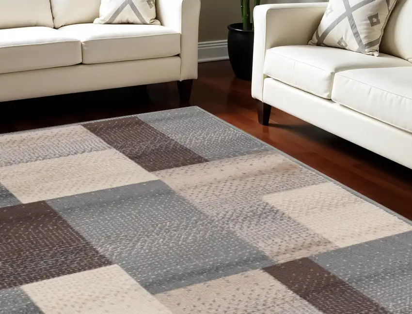 Gray Brown and Cream Patchwork Area Rug Photo 1