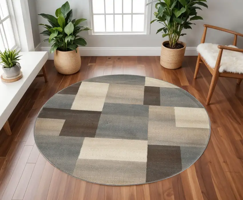 8' Gray Tan And Brown Patchwork Round Rug Photo 1