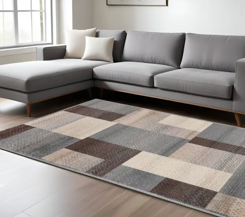 Gray Brown and Cream Patchwork Area Rug Photo 1