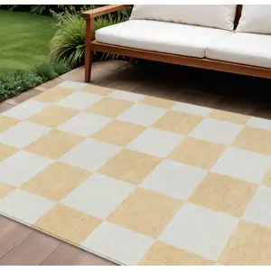 Photo of Peach And Beige Geometric Washable Indoor Outdoor Area Rug