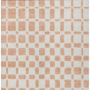 Photo of Peach And Beige Geometric Washable Indoor Outdoor Area Rug
