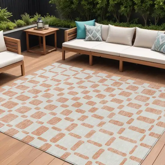 Peach And Beige Geometric Washable Indoor Outdoor Area Rug Photo 1