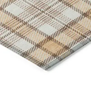 Photo of Peach And Beige Plaid Washable Indoor Outdoor Area Rug