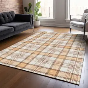 Photo of Peach And Beige Plaid Washable Indoor Outdoor Area Rug