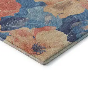 Photo of Peach And Blue Floral Washable Area Rug With UV Protection
