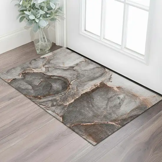 Peach And Gray Abstract Washable Area Rug With UV Protection Photo 1