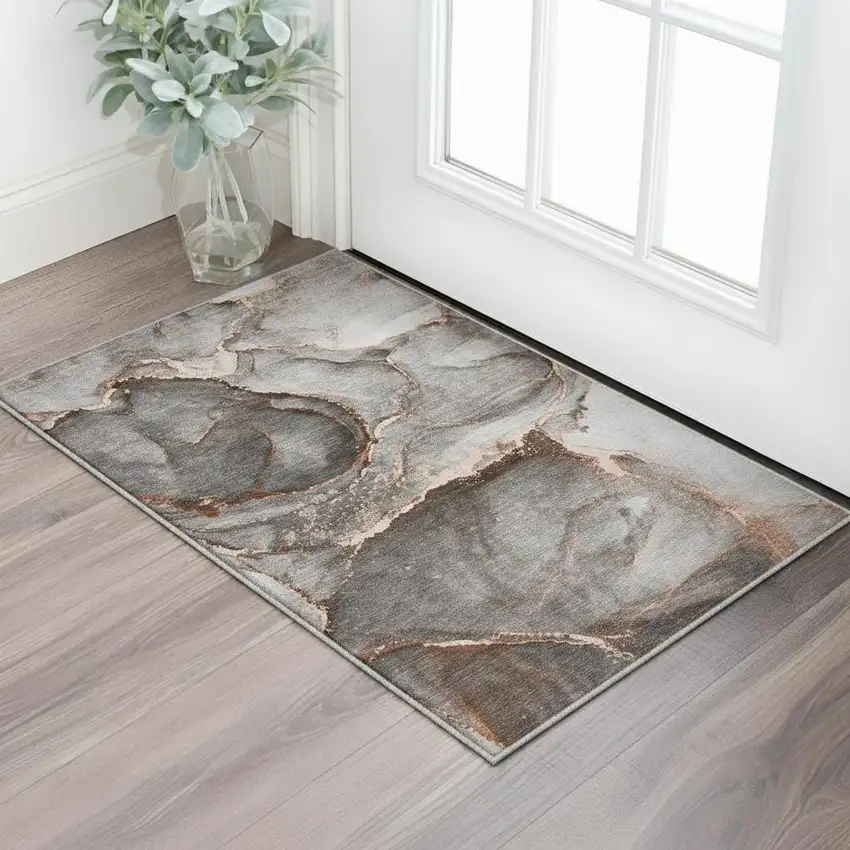 Peach And Gray Abstract Washable Area Rug With UV Protection Photo 1