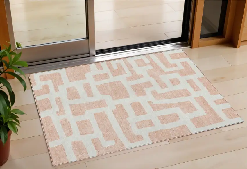 Peach And Gray Abstract Washable Indoor Outdoor Area Rug Photo 1