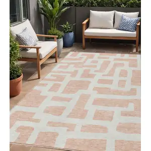 Photo of Peach And Gray Abstract Washable Indoor Outdoor Area Rug