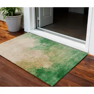 Photo of Peach And Green Abstract Washable Indoor Outdoor Area Rug