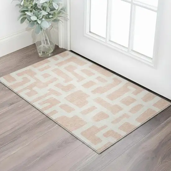 Peach And Ivory Abstract Geometric Washable Area Rug With UV Protection Photo 2