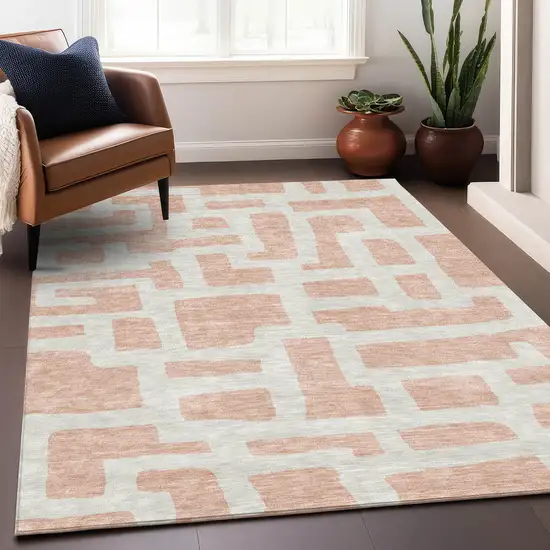 Peach And Ivory Abstract Geometric Washable Area Rug With UV Protection Photo 5