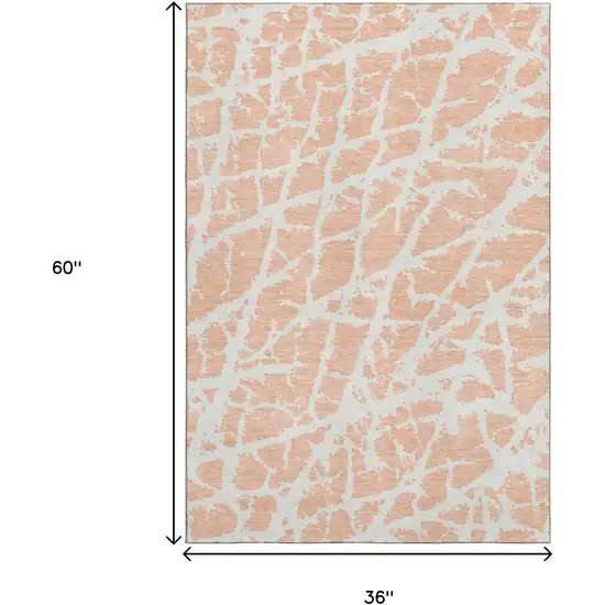 Peach And Ivory Abstract Washable Area Rug With UV Protection Photo 7