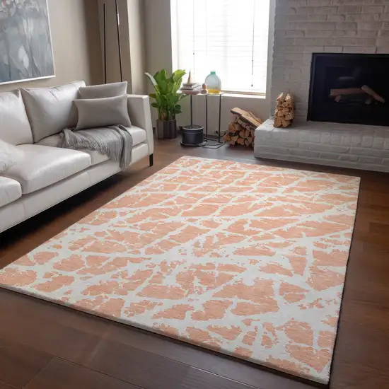 Peach And Ivory Abstract Washable Area Rug With UV Protection Photo 6