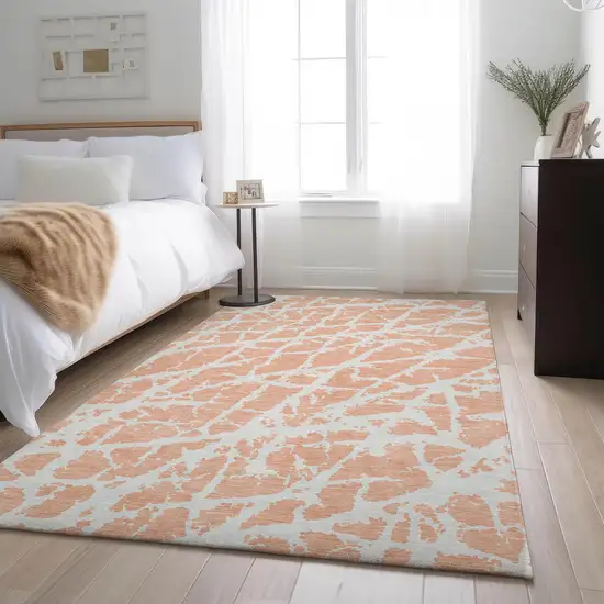 Peach And Ivory Abstract Washable Area Rug With UV Protection Photo 5