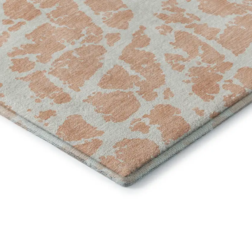 Peach And Ivory Abstract Washable Area Rug With UV Protection Photo 9