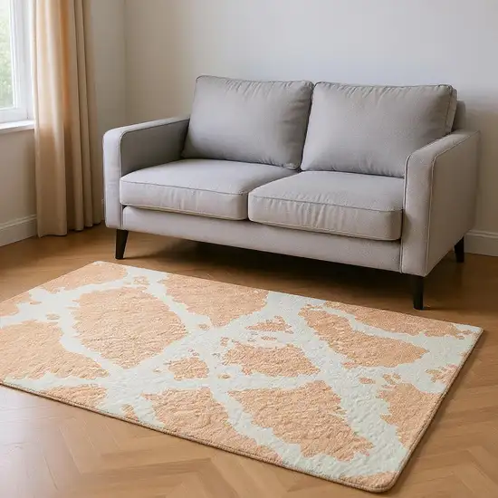 Peach And Ivory Abstract Washable Area Rug With UV Protection Photo 2
