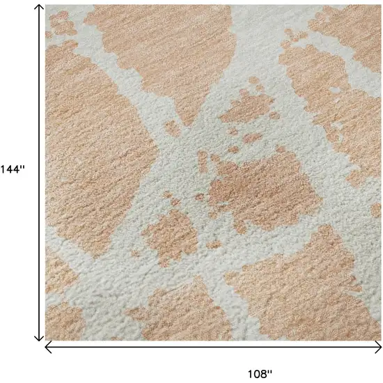 Peach And Ivory Abstract Washable Area Rug With UV Protection Photo 9