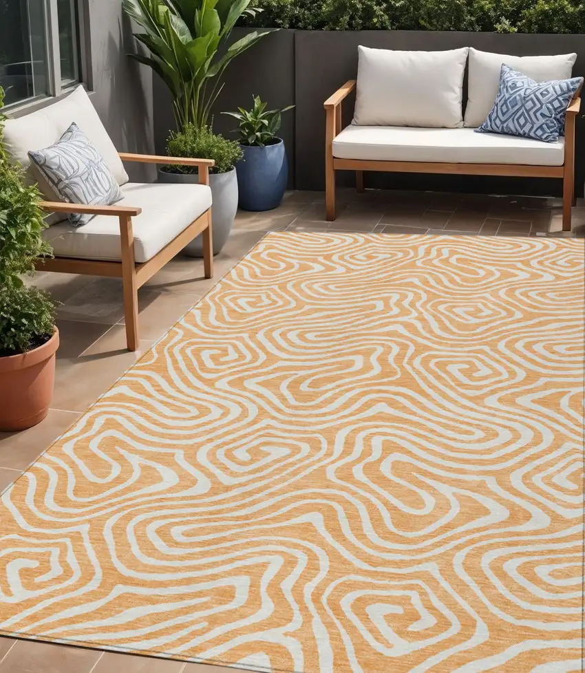 Peach And Ivory Abstract Washable Indoor Outdoor Area Rug Photo 1