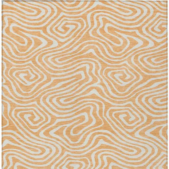 Peach And Ivory Abstract Washable Indoor Outdoor Area Rug Photo 8