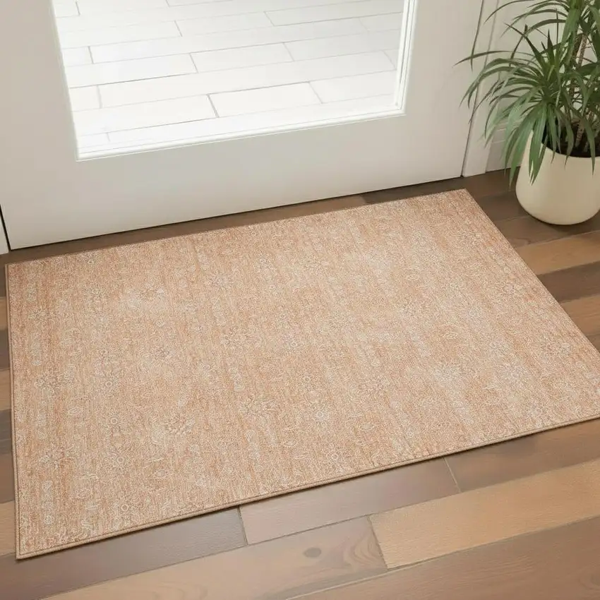 Peach And Ivory Floral Washable Area Rug With UV Protection Photo 1