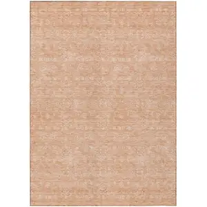 Photo of Peach And Ivory Floral Washable Indoor Outdoor Area Rug