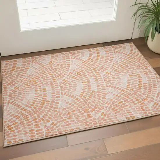 Peach And Ivory Geometric Washable Area Rug With UV Protection Photo 1