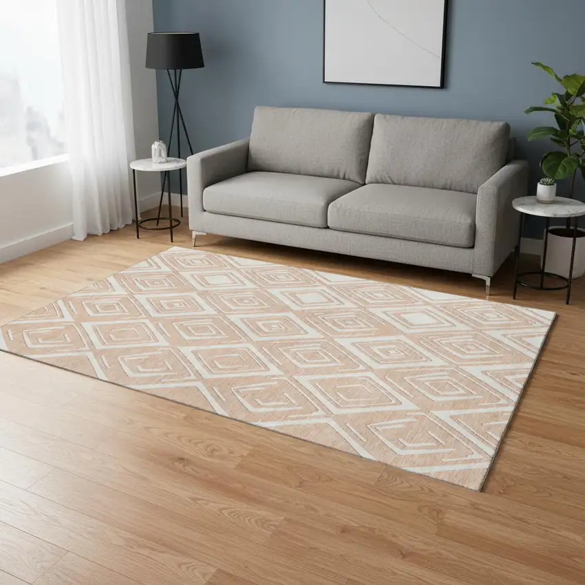 Peach And Ivory Geometric Washable Area Rug With UV Protection Photo 1