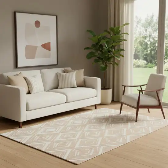 Peach And Ivory Geometric Washable Area Rug With UV Protection Photo 1